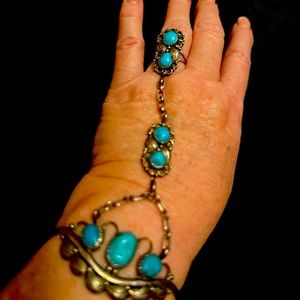 Turquoise and Sterling Silver Slave Bracelet. The pictures don’t do it justice,